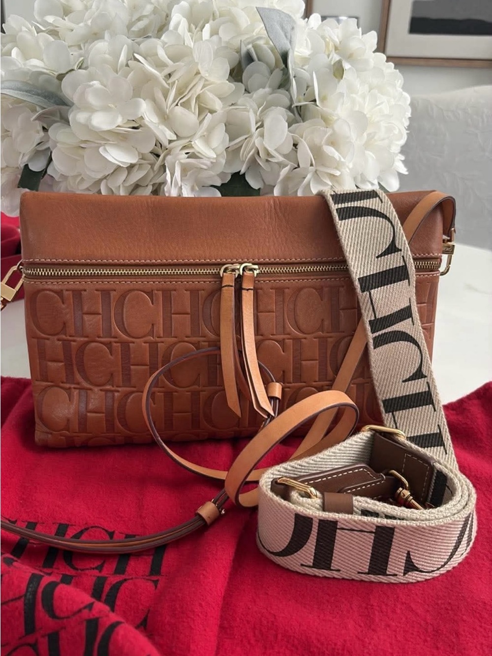 Carolina Herrera Camel Brown Embossed CH Crossbody with Logo Strap